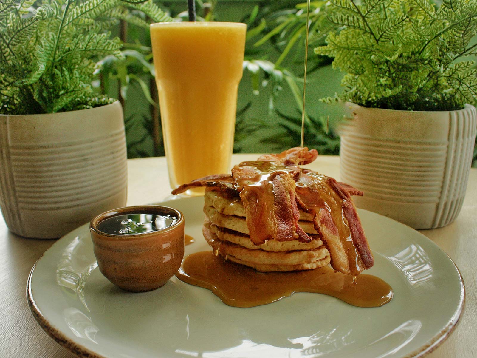Pancakes with Streaky bacon and syrup